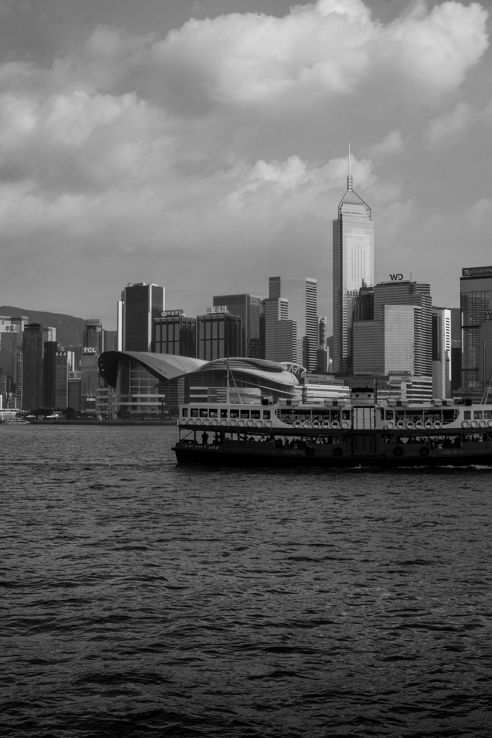 A Star Ferry crossing Victoria Harbour past the Hong Kong skyline